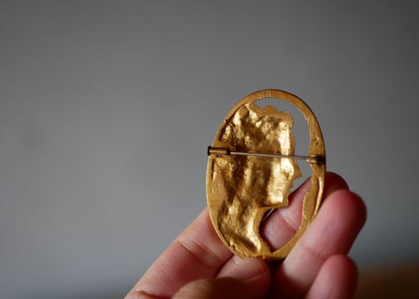 Bronze Face Brooch