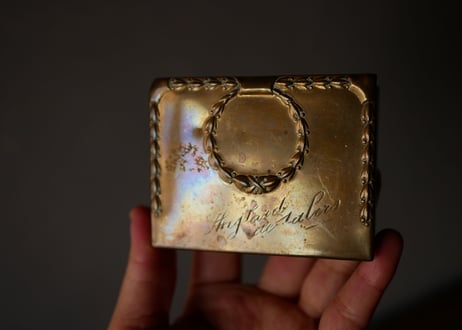 Metal box for stamps