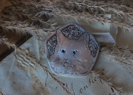 CAT brooch