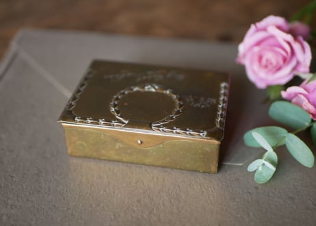 Metal box for stamps