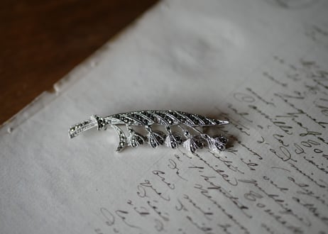 muguet brooch