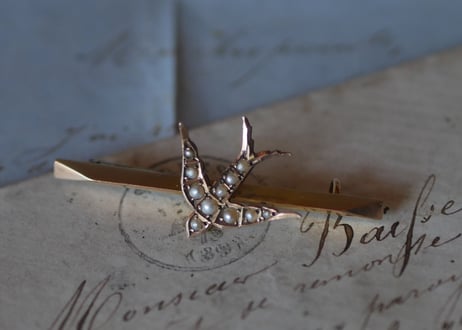 9K swallow brooch