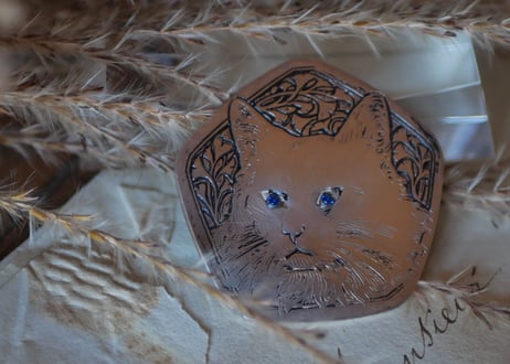 CAT brooch