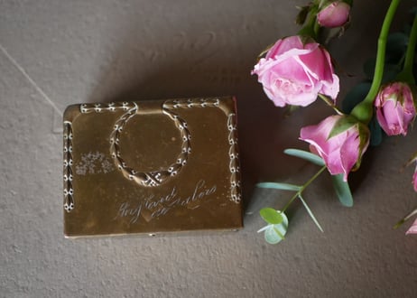 Metal box for stamps