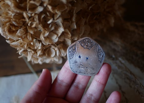 CAT brooch