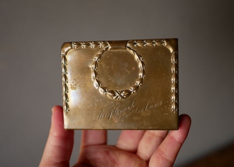 Metal box for stamps
