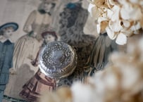 Compact case, Monogram