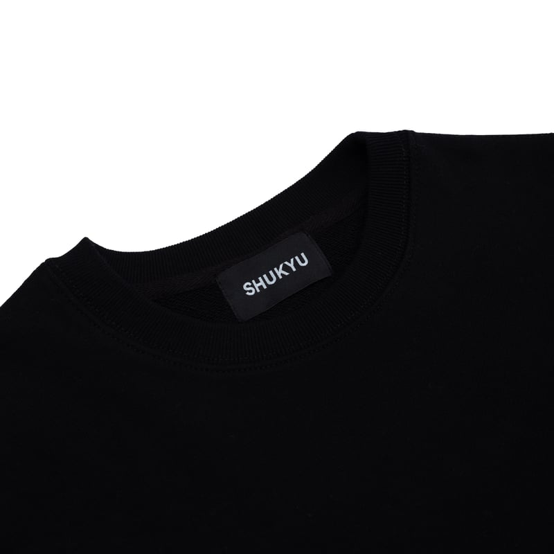 SHUKYU × J.LEAGUE - Symbol Mark Crewneck (Black SHUKYU × J.LEAGUE - Symbol Mark Crewneck (Black