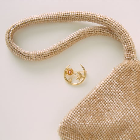 crescent brooch *flower