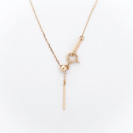 golden goose with an egg pendant
