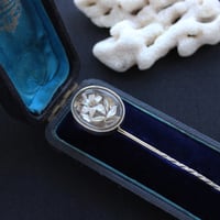 silver lily pin with rock crystal quartz