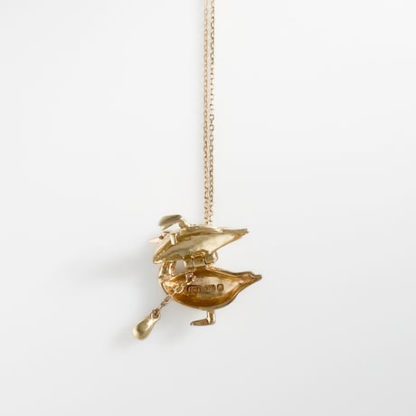 golden goose with an egg pendant