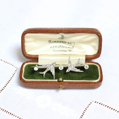 double swallow brooch