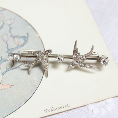 double swallow brooch