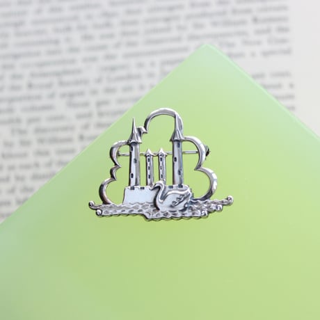 swan and castle brooch