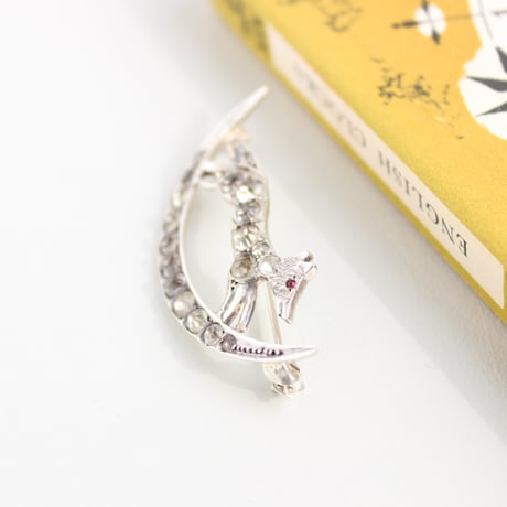 crescent and jumping fox brooch