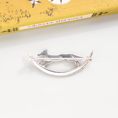 crescent and jumping fox brooch