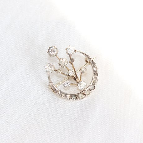 crescent and fireworks brooch