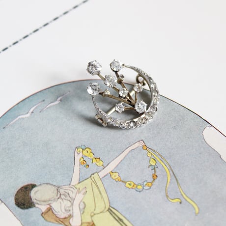 crescent and fireworks brooch