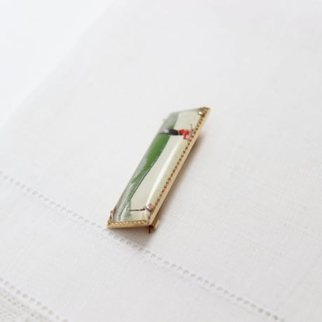golfer brooch *reverse painted