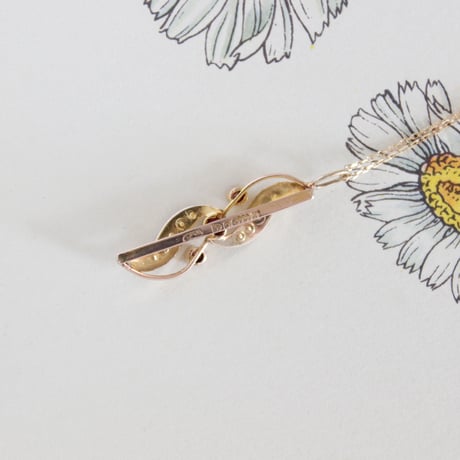 wave pendant *9ct+10ct gold, pink sapphire and pearl