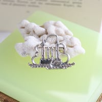 swan and castle brooch