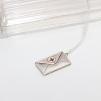 red cross pendant