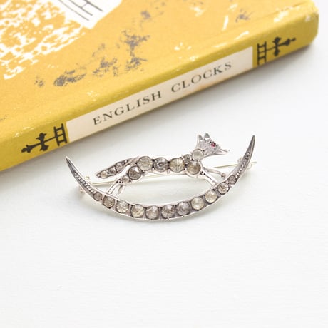 crescent and jumping fox brooch