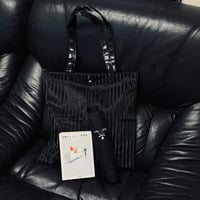 factory sample pleats bag black