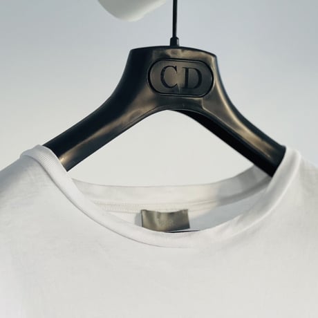 DIOR visitor logo tops