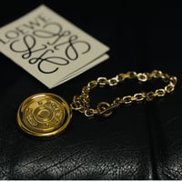 loewe silver anagram logo charm bracelet