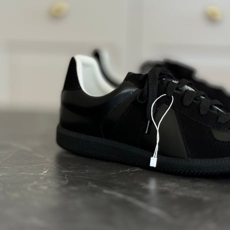 factory sample all black german trainer