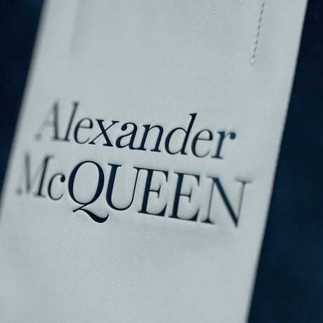 alexsander mcqueen leather logo bag