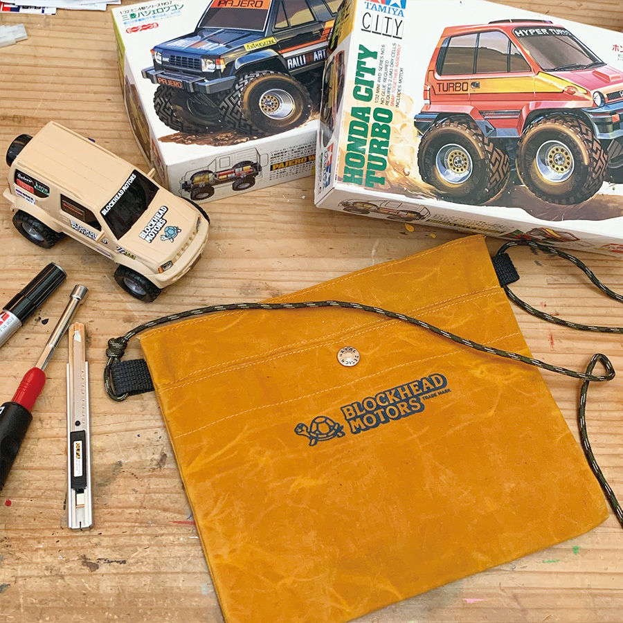 NATAL DESIGN x BLOCKHEAD MOTORS コラボサコッシュ | BLOC