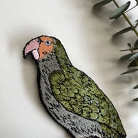 オウムのブローチ
