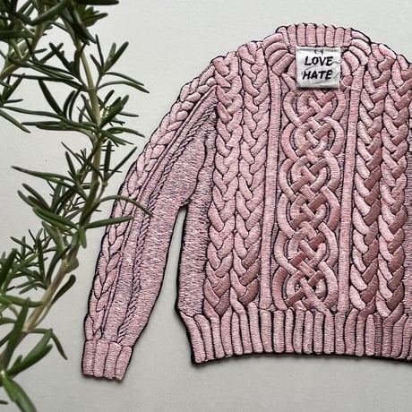 ピンクのセーター