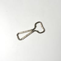 USED "LUCKEY LAGER" AGE-DATED BEER BOTTLE OPENER