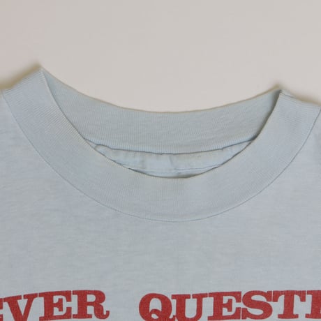 USED "NEVER QUESTION AUTHORITY" Tshirts