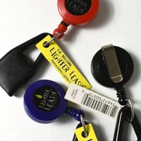 "LIGHTER LEASH" RETRACTABLE LIGHTER HOLDER