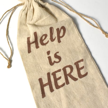 USED "HELP IS HERE" DRAWSTRING BAG