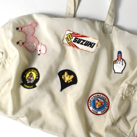 USED UNKNOWN PATCHED NYLON DUFFLE BAG
