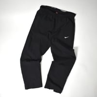 USED "NIKE" POLY PANTS