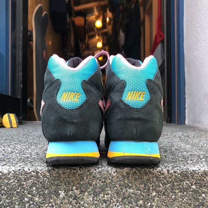 Nike teal and black shoes on sale