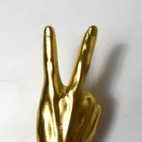 USED "PEACE SIGN HAND STATUE"