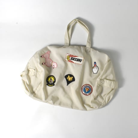USED UNKNOWN PATCHED NYLON DUFFLE BAG