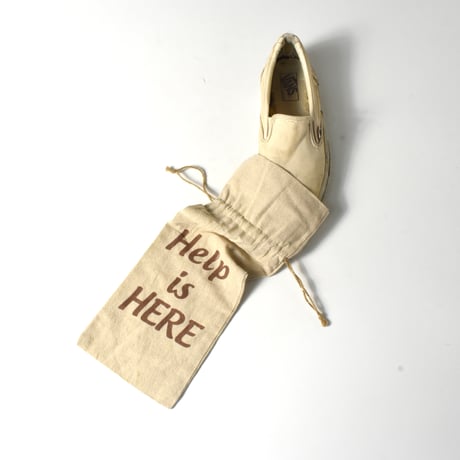 USED "HELP IS HERE" DRAWSTRING BAG