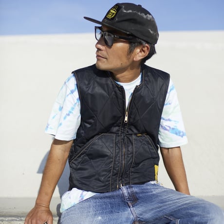 gold school vest