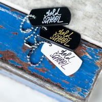 gold school dog tag
