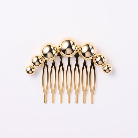 Sphere comb / gold color