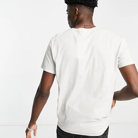 Religion logo pocket t-shirt